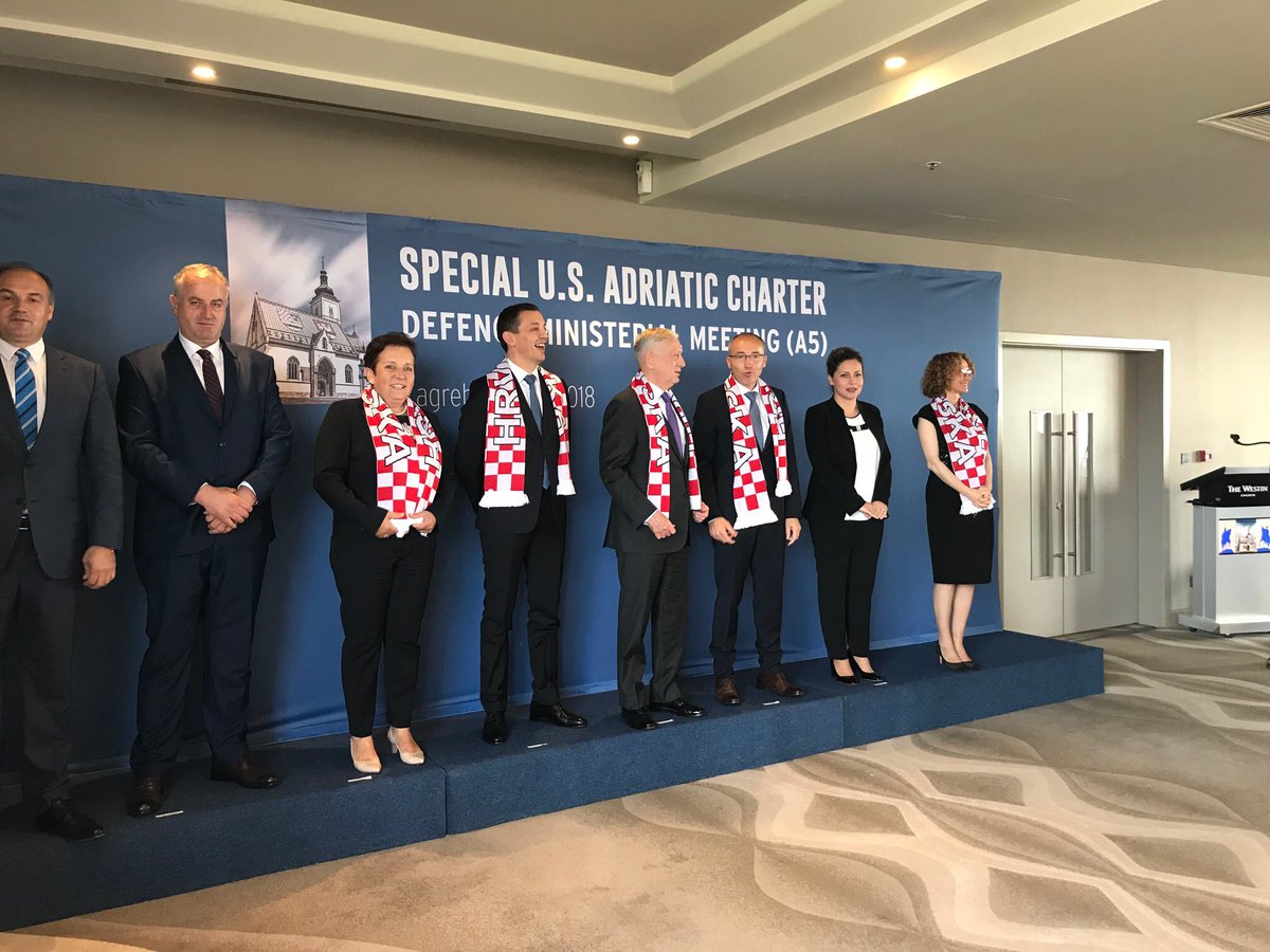 After meetings in Zagreb, SecDef Mattis wears Croatian soccer scarf in photo op, handed out by the country's Minister of Defense.